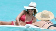 Check out sunny shots of Hollywood's hottest bods gracing our nation's (okay, mostly just California's) hottest beaches!